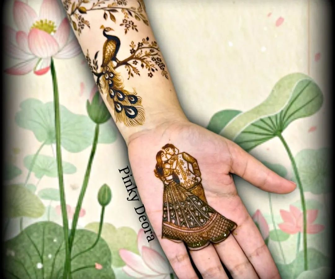 Your love story, right on your hands. For this engagement mehndi, I created a delicate portrait of the couple's proposal moment on the palm, complemented by a modern floral vine with a peacock on the arm. It’s a perfect example of how we can make your mehndi deeply personal and unique.