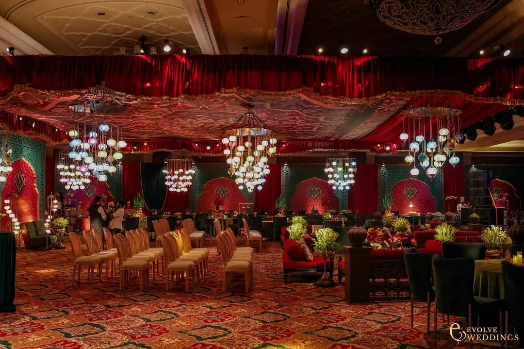 This is a glimpse into a Sufi Durbar I reimagined within a modern lounge. The design blends rich reds, layered arches, and Indo-Islamic prints to create a space steeped in music and poetry, where every detail becomes a verse in the celebration of love.