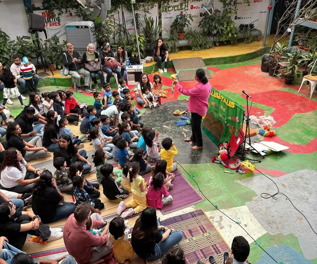 I can turn any space, big or small, into a theatre of imagination. Here I am at a school event, sharing a story with over a hundred families. It brings me so much joy to see both kids and parents completely absorbed in the performance together.