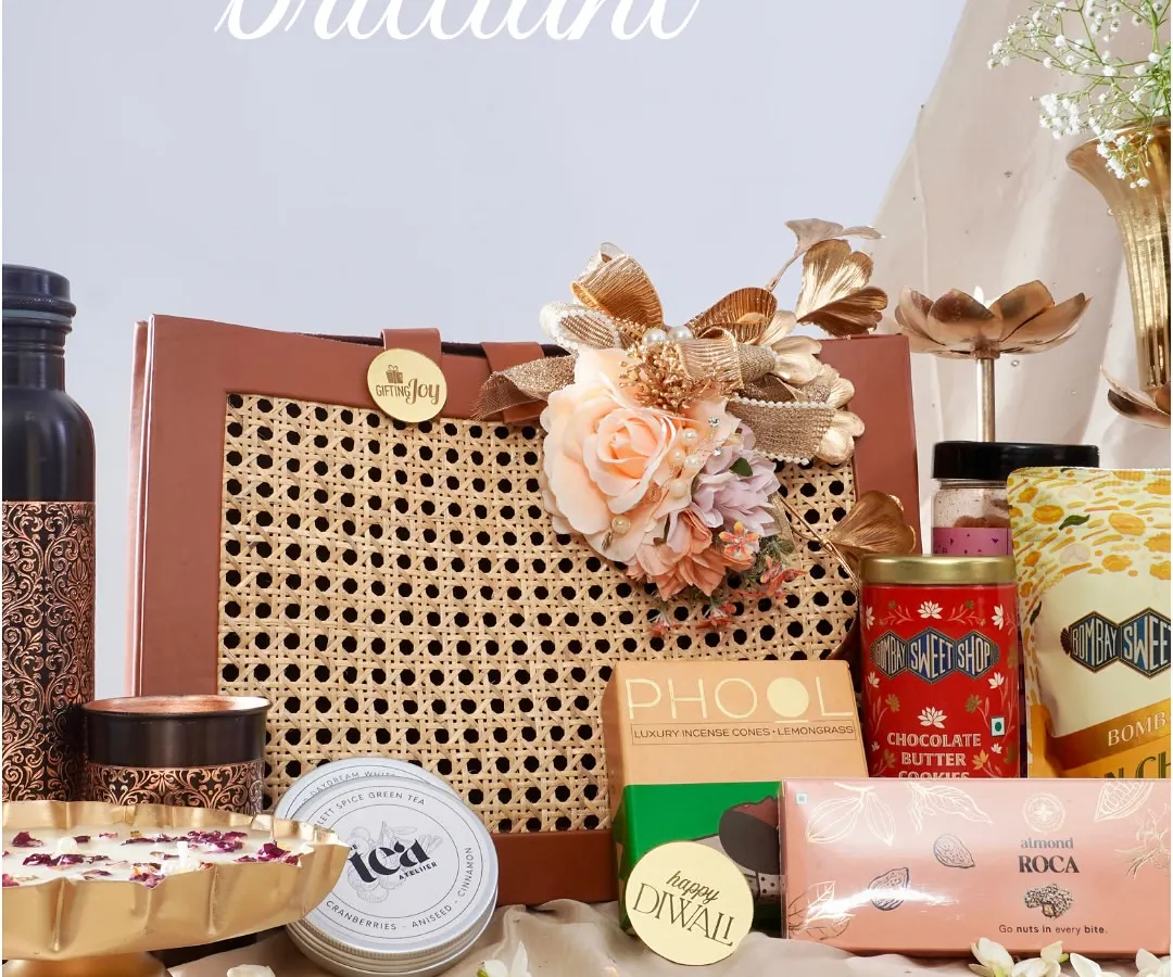 A gift should be an experience. I love curating a collection of bold, bright, and brilliant items that come together to tell a story, like this assortment featuring gourmet treats, artisanal chocolates, and fragrant wellness products.