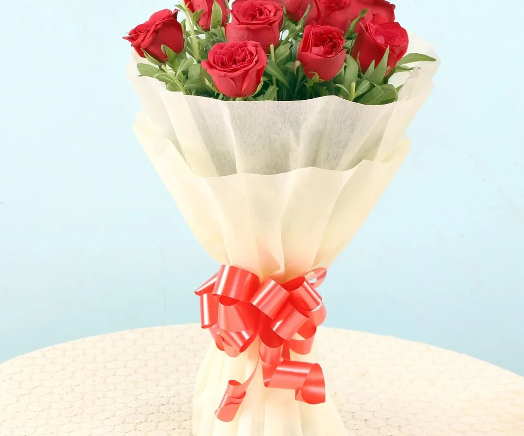 A timeless classic, this hand-tied bouquet of a dozen fresh red roses is the perfect way to express love and passion. I ensure each rose is vibrant and perfectly bloomed, making it an ideal choice for anniversaries, Valentine's Day, or a grand romantic gesture.
