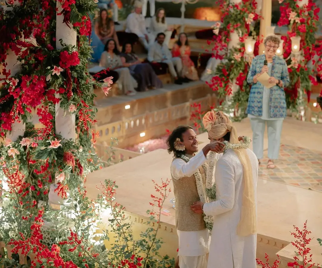 For Kahran and Gourav's Vogue-featured wedding, we designed this breathtaking mandap, using monochromatic red florals to create a powerful contrast against the Jaisalmer sandstone. This ceremony was a testament to their story, blending tradition with a bold, modern vision.