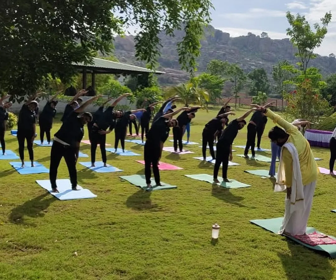 Join our daily yoga sessions on the lawn, where you can breathe in fresh air and stretch your body against a backdrop of serene hills. This practice is central to our weight management program, designed to build strength and flexibility.