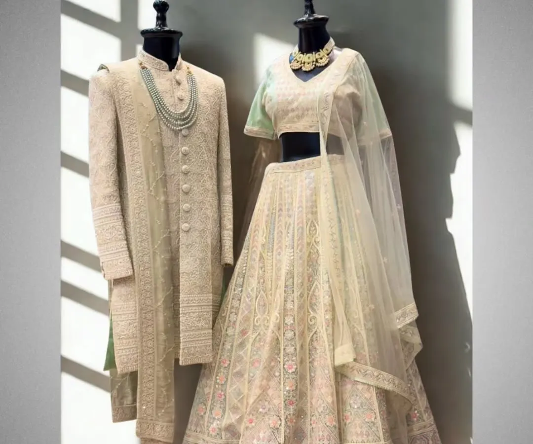 A perfect match. This is the kind of timeless elegance I aim for, pairing a beautifully detailed sherwani with a complementary lehenga. This is the ideal look for a couple on their big day.