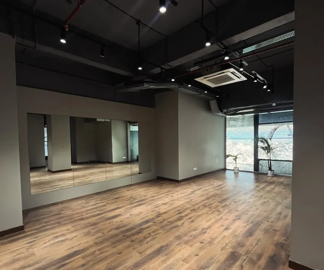 Our wall-to-wall mirrors are essential for perfecting your craft. I made sure they were a key feature, so you can check your choreography, monitor your form during a workout, or get that perfect group shot. The reflection helps create a sense of a larger, more energetic space.