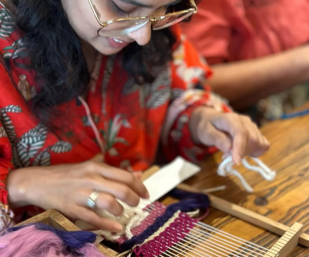 Here is a participant completely absorbed in her work, finding a quiet focus as she weaves. My workshops are all about this feeling of mindful creation, where the process is just as important as the finished piece. No experience is needed, just a willingness to try.