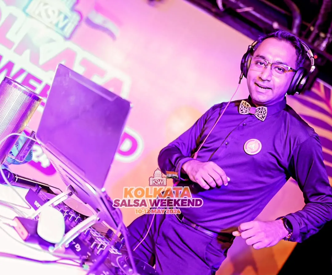 In the zone at the Kolkata Salsa Weekend. When I'm behind the decks, my focus is on the dancers and the energy of the room. I'm not just playing songs; I'm building a journey for the dance floor.
