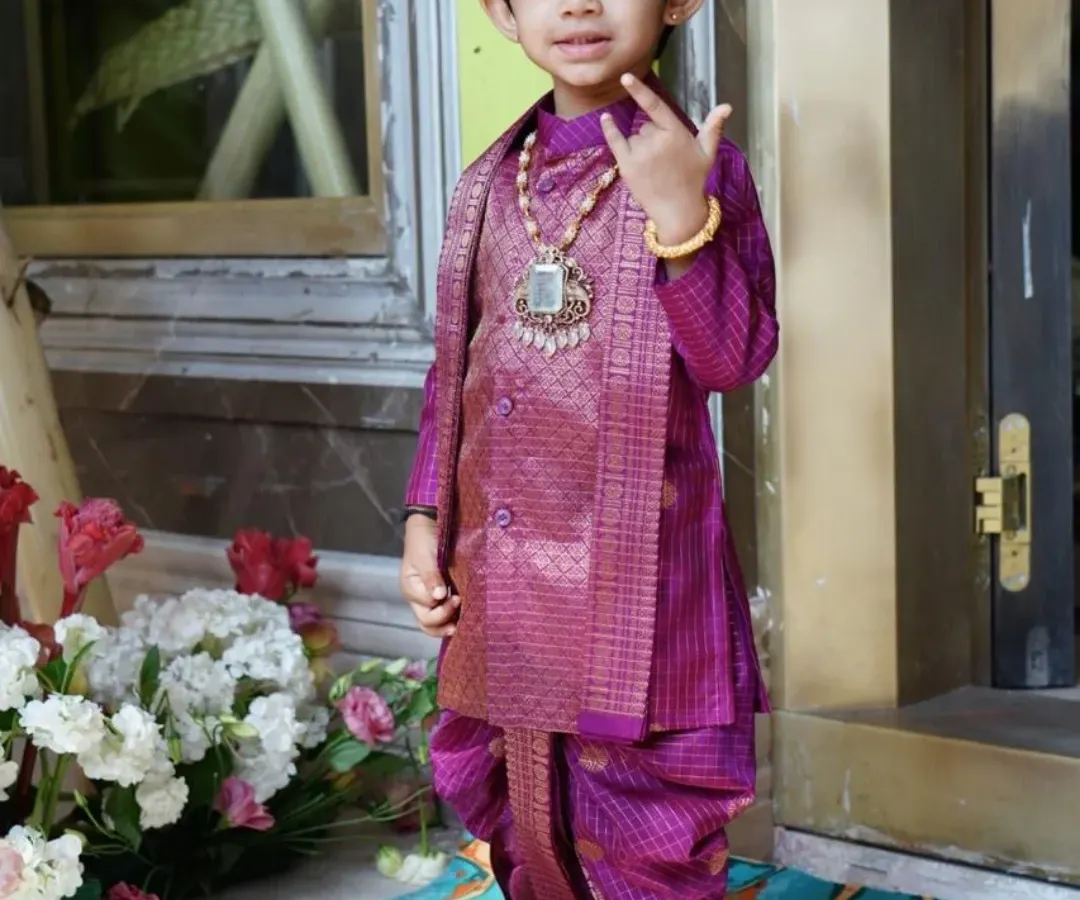 Here is another look at this charming dhoti-kurta ensemble, showcasing the soft silk fabric and detailed craftsmanship. My focus is on creating children's festive wear that is both authentic and easy to wear, so they can enjoy the occasion without any fuss.