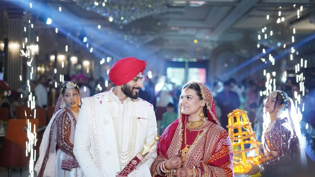The grand entry of the couple is always a highlight. Here, I used sparklers to create a magical, star-lit path for them, capturing the love and excitement in their eyes as they begin their new journey together.