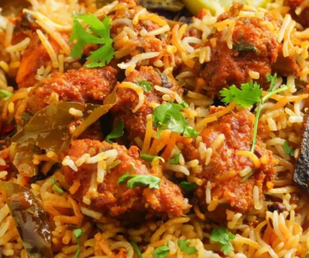 My Chicken Biryani is pure comfort in every spoonful. I prepare it with tender chicken pieces and long-grain basmati rice, slow-cooked with my special blend of homemade masalas. It's a favorite for corporate lunches and weekend parties.