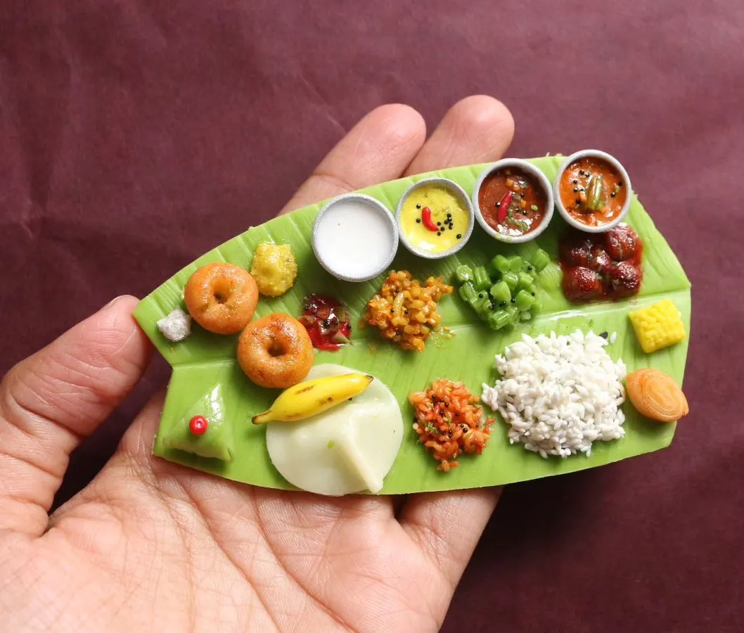 This is a complete Andhra-style meal, served on a miniature banana leaf. In my courses, I teach you how to create every single element, from the perfectly textured rice and tiny vada to the different curries and pickles, making it a true feast for the eyes.