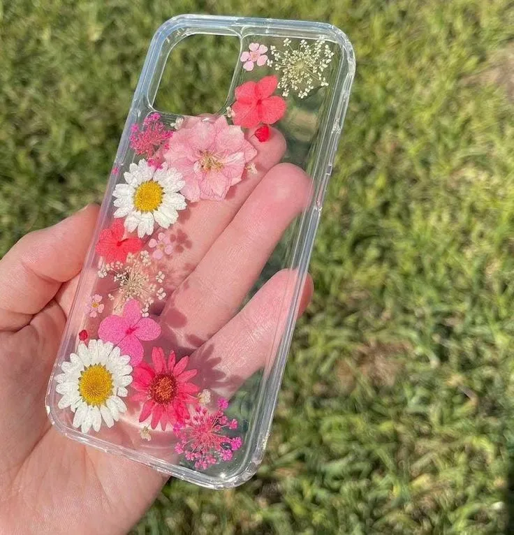 Protect your phone with a personal touch. This custom floral phone case is made with real, carefully placed pressed flowers, all sealed in crystal-clear resin. You can choose the flowers and layout to match your style perfectly.