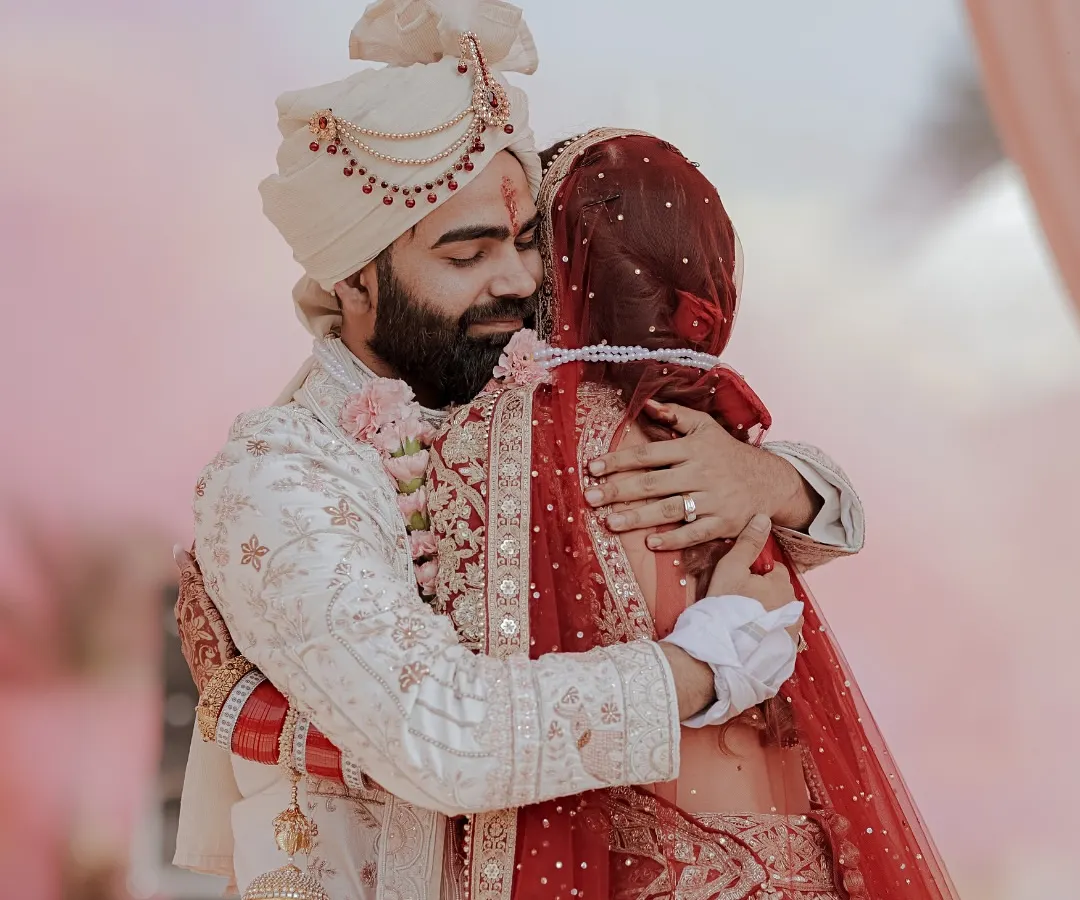 In this single, heartfelt embrace after the ceremony, an entire story unfolds. We focus on capturing these powerful, unscripted wedding moments that you will cherish for a lifetime, feeling the same emotion years from now.