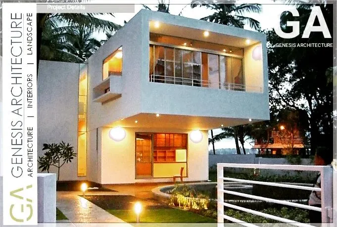 A contemporary villa designed for a compact plot in Bangalore. The structure uses a clean, minimalist aesthetic with strategic lighting that gives the home a warm, inviting glow after sunset, proving that modern design can also feel like a sanctuary.