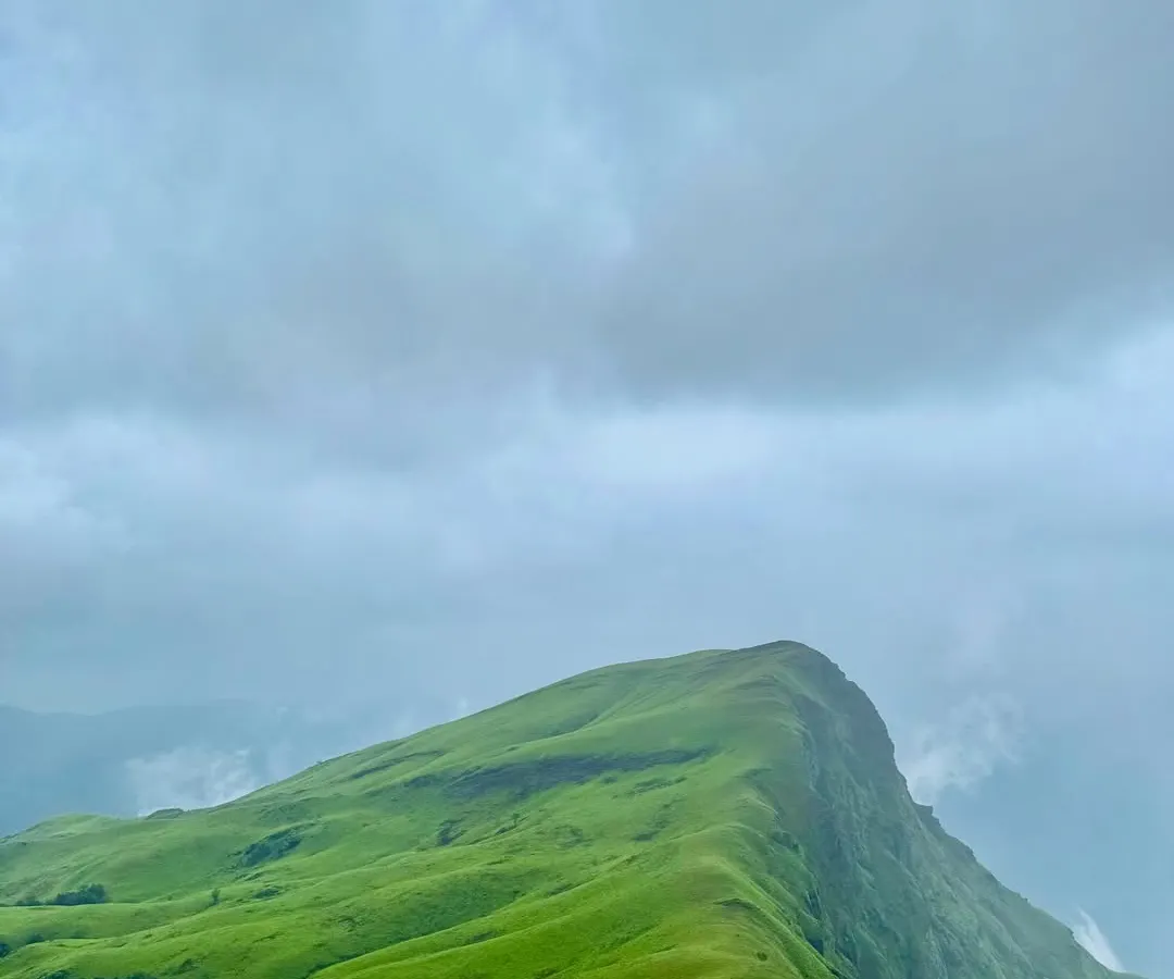 This is the view that makes the Netravati trek famous. The rolling green hills of the Western Ghats, often covered in a blanket of clouds, create a picture perfect moment. This is one of my most popular monsoon treks from Bengaluru.
