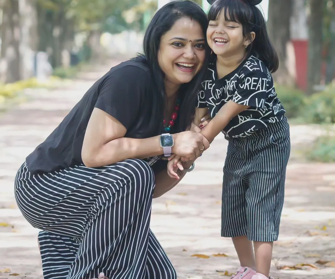 The best moments are the ones you don't pose for. My goal during a family shoot is to capture the real connection and joy, like this beautiful, candid laugh between a mother and her daughter during an outdoor session.