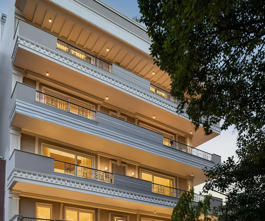 The facade of the KAIRA residence in South Delhi, a project defined by its carefully curated neo-classical elements. We used intricate mouldings and motifs to create a distinguished presence on a busy urban street.