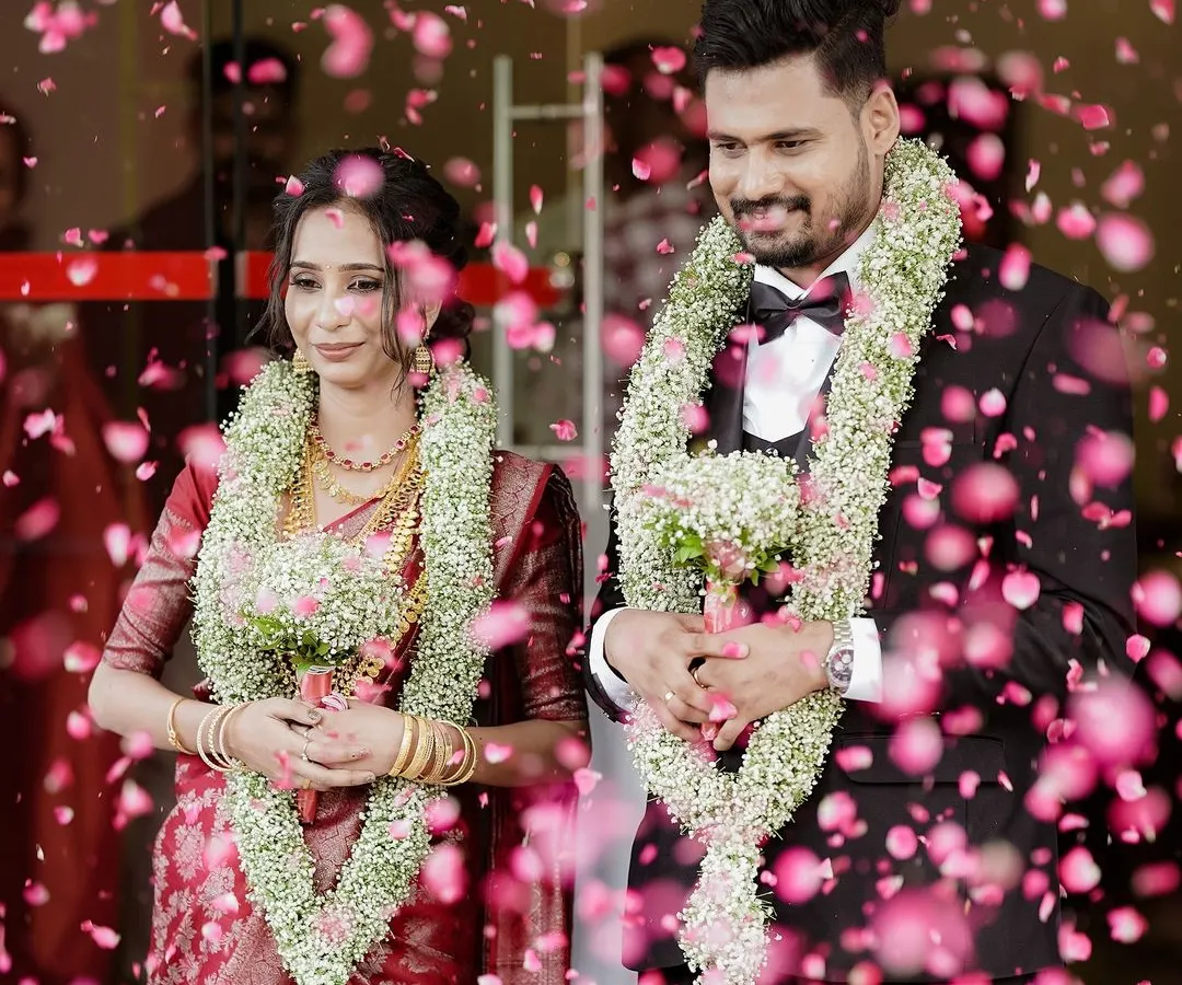 A shower of blessings and petals! This is one of my favorite moments from a Christian wedding ceremony, capturing the pure, explosive joy of the couple as they are celebrated by their loved ones.