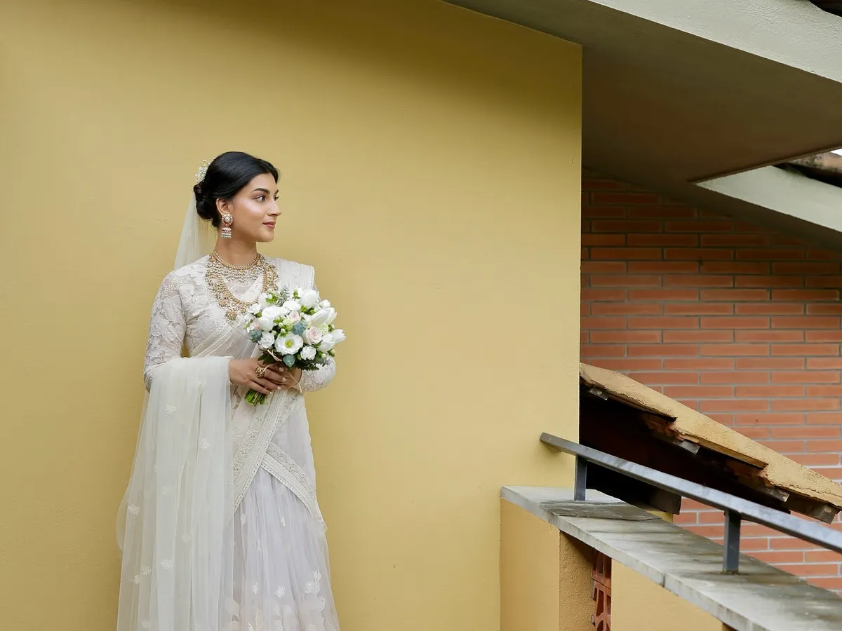 Draping this ethereal Sabyasachi creation for a beautiful bride. My focus was on creating a clean, sophisticated silhouette that allowed the delicate lacework and embroidery of the wedding saree to shine through.