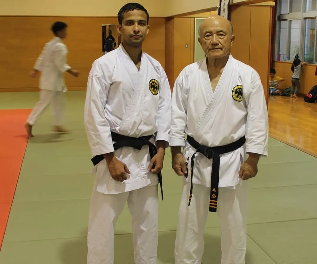 Here I am with my teacher, Grand Master Sensei Zenpo Shimabukuro. My instruction comes directly from this Shorin-ryu Seibukan lineage, ensuring you learn the authentic art as it is taught in Okinawa.