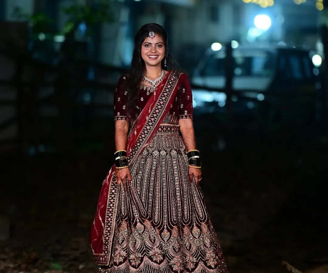 For Bhumika's reception, we went for a classic glamorous look. The makeup features a soft smokey eye and a neutral lip to balance her magnificent velvet lehenga, ensuring she was the star of the evening.