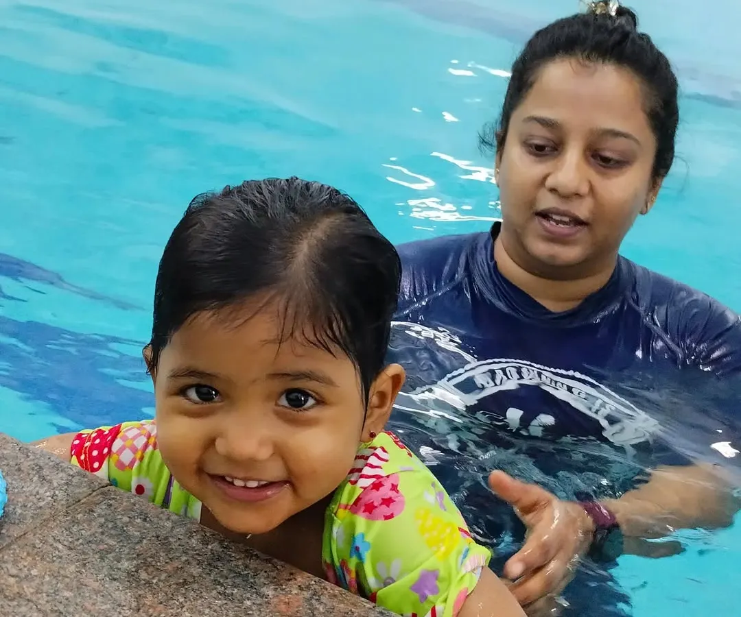 It's never too early to love the water. I create a safe and joyful space for our tiniest swimmers, like this little one, in our parent-and-toddler classes.
