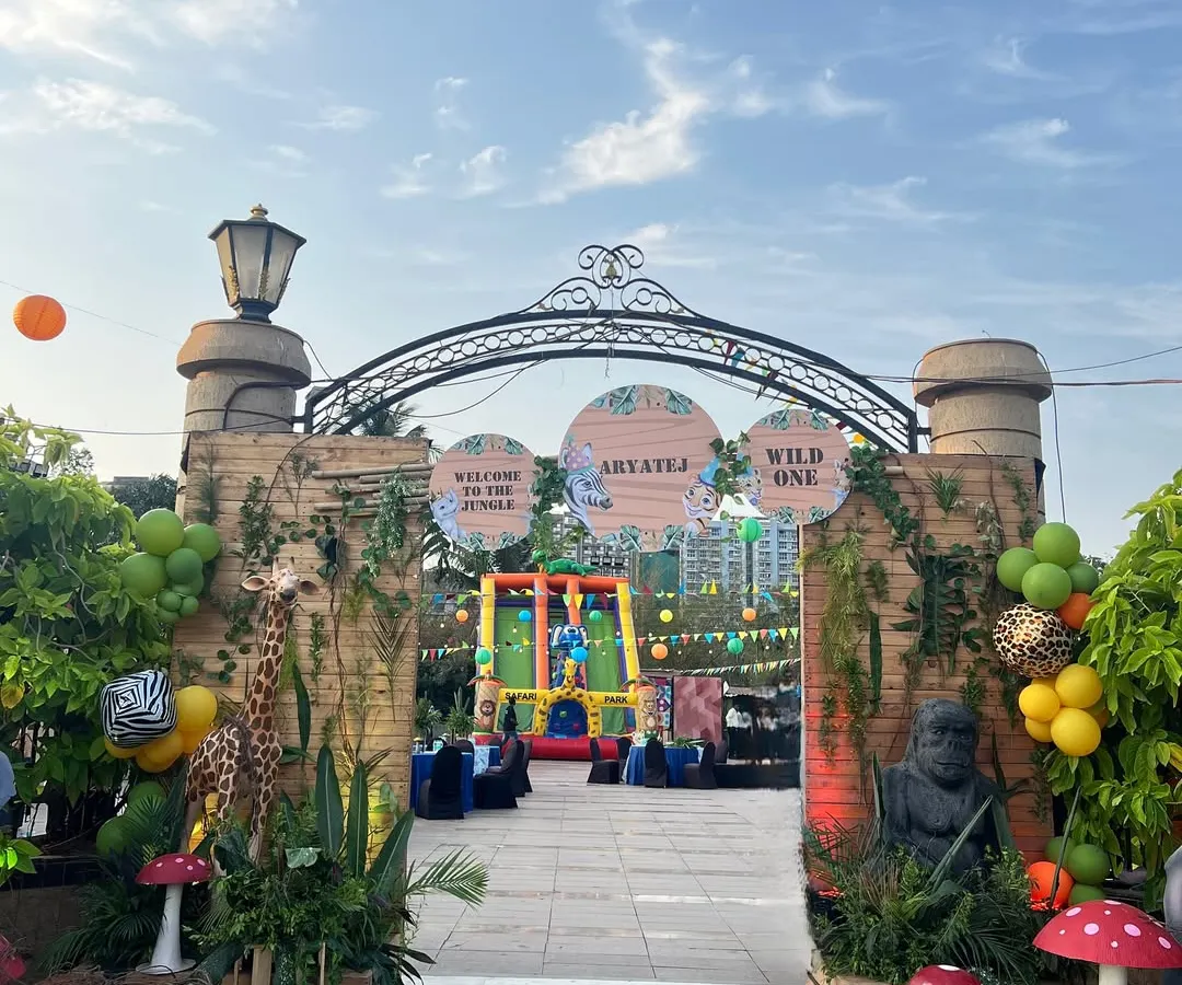 We specialize in bringing grand themes to life, like this 'Wild One' safari adventure. The custom entrance arch, complete with life-sized animal props and lush greenery, set the stage for an unforgettable first birthday celebration.