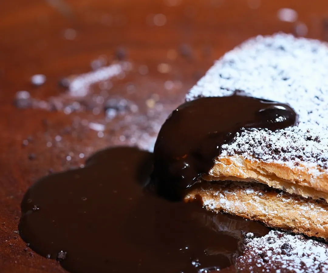 This is my 100% vegan Chocolate French Toast. It’s the ultimate guilt-free indulgence, with warm, decadent chocolate sauce over perfectly crisp toast. It’s pure comfort on a plate.
