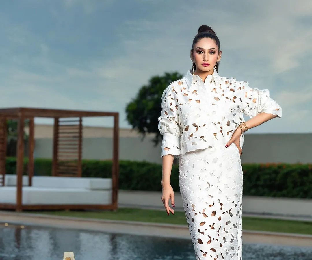 This is a powerful editorial shot from a magazine cover shoot at a luxury property. I focused on strong composition and using the natural light against the poolside architecture to create a majestic and unapologetic look. This demonstrates my approach to high-fashion photography.