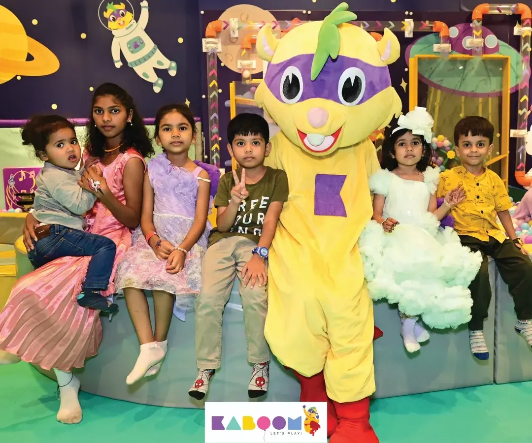 Nothing makes us happier than seeing these smiles! Our friendly mascot, Super K, loves joining the party to give hugs, pose for photos, and make your child's day extra special.
