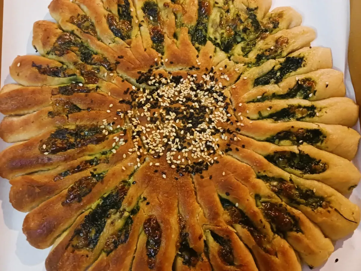 My gluten-free Millet Sunflower Bread, stuffed with spinach and my homemade vegan cheese. It's not just food; it's edible art that is both beautiful and nourishing, perfect as a centrepiece for any gathering.