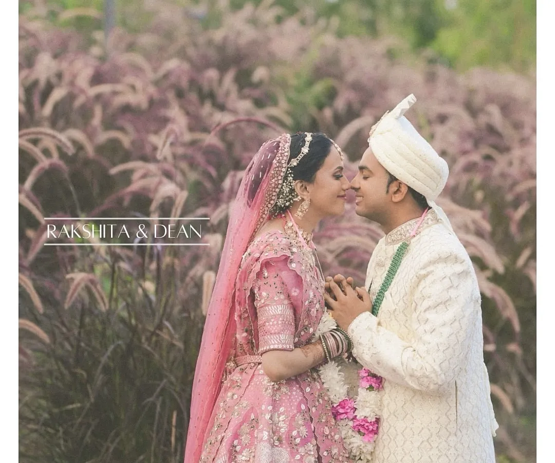This is the magic we create. A perfectly coordinated couple, Rakshita and Dean, lost in their moment. We handled their styling completely virtually, proving that distance is no barrier to creating your dream wedding look.