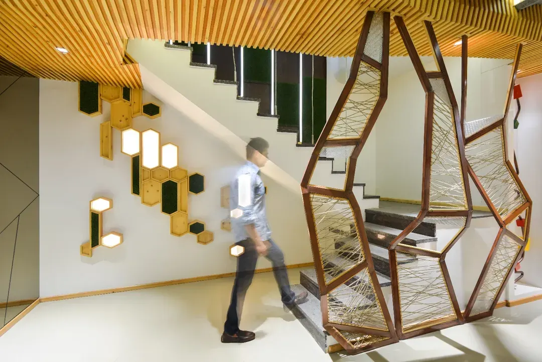 For the AMG Real Estate Office, I transformed a challenging basement space into a dramatic, modern lobby. The design uses an open-plan layout and a striking staircase to create a sense of openness and aesthetic harmony, setting a sophisticated tone from the moment of entry.