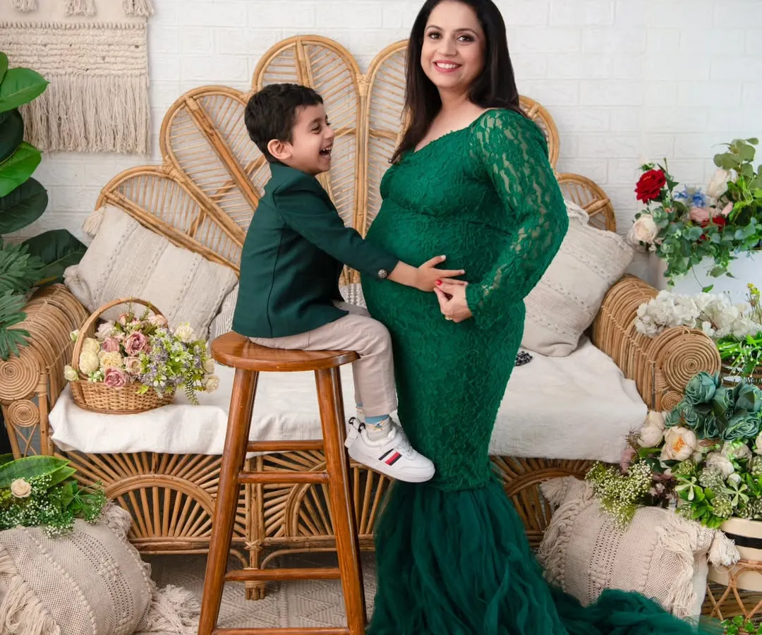 The joy of a growing family. We captured the beautiful anticipation of a mother awaiting her new arrival, and the pure excitement of a big brother to be, all within our cozy boho studio setup.