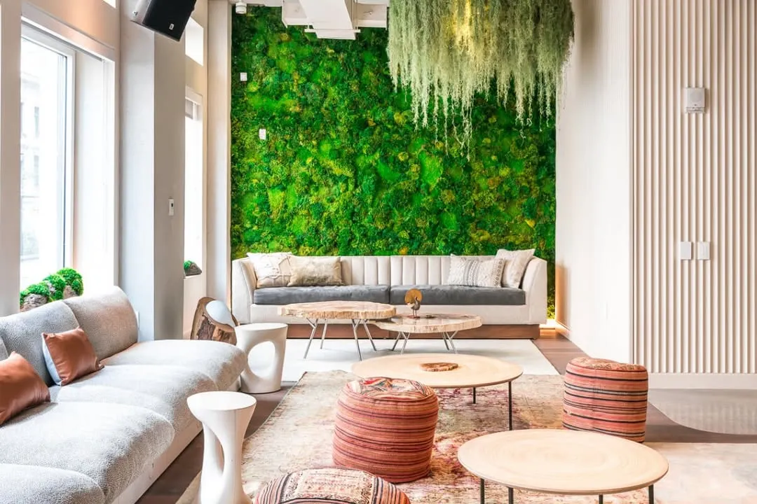 This is an example of a preserved moss wall we installed in a corporate lounge area. These living walls provide a stunning visual impact and improve room acoustics, all with minimal maintenance requirements, making them ideal for commercial interior design.