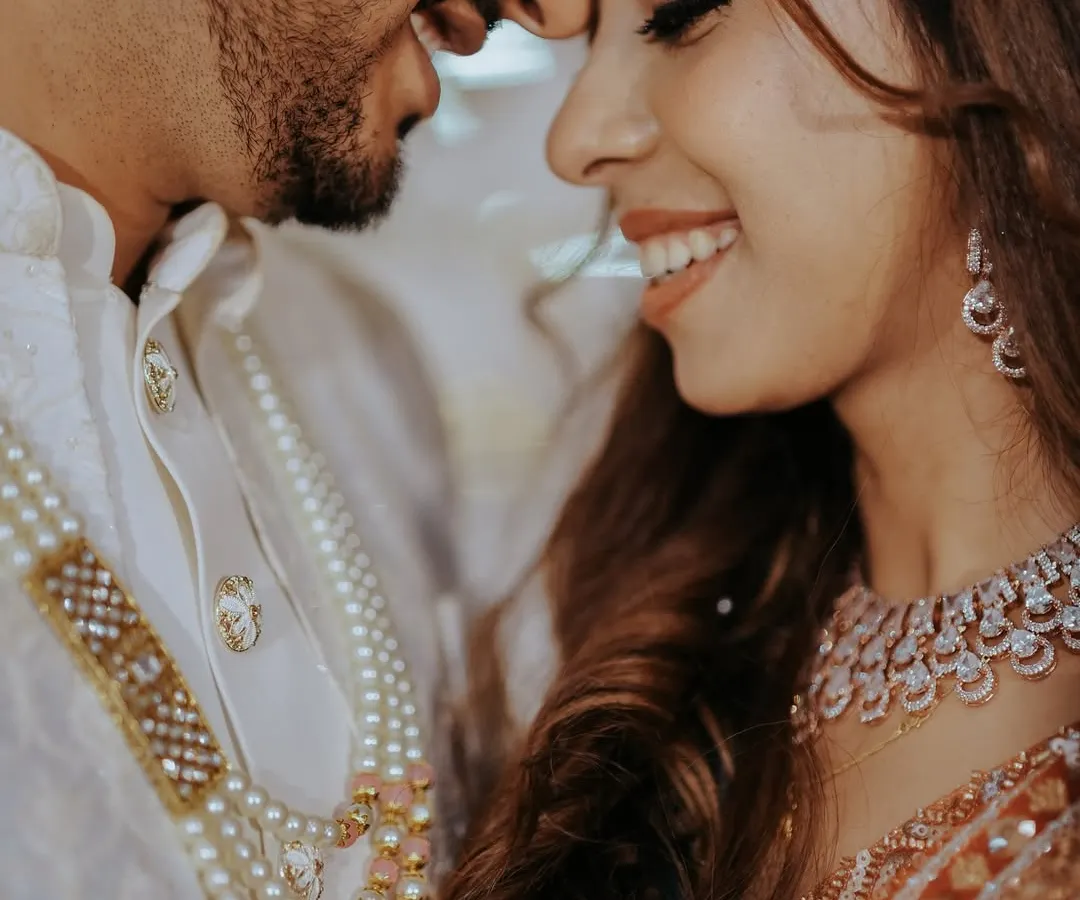 The easiest 'yes' ever. In this quiet, close moment, I see a whole universe of promises and smiles. It’s these gentle, unspoken connections that I love to frame, turning a simple glance into a timeless memory.