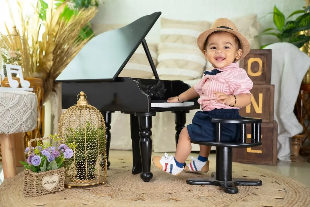 A first birthday is a big deal, and I love creating setups that are as unique as your little one. This piano theme was perfect for a budding maestro, filled with laughter and happy tunes.