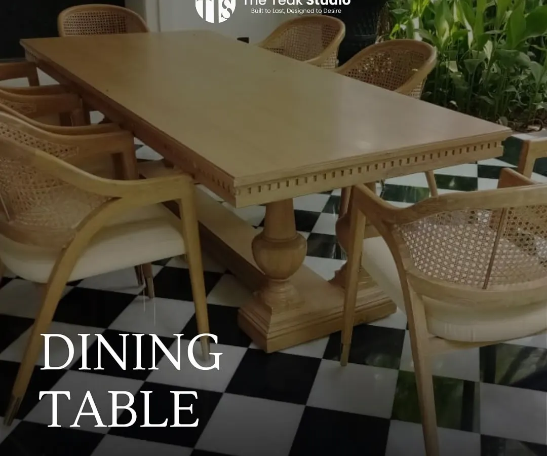For this farmhouse project in NCR, I crafted a classic dining set from solid teak wood. The table features a robust pedestal base and intricate edge detailing, paired with comfortable armchairs that combine a solid wood frame with natural rattan weaving.