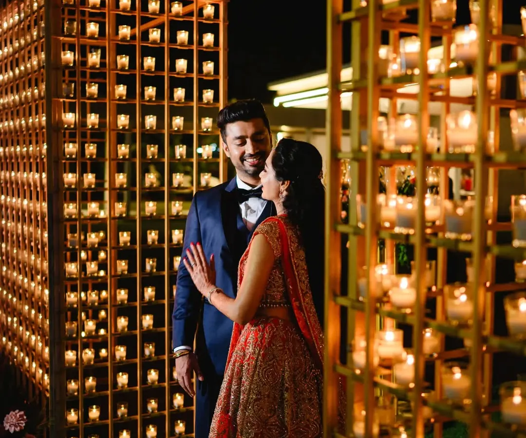 For a couple that wanted pure romance, I created this signature candle wall. It makes for a stunning, warm backdrop for reception photos and creates an unforgettable, intimate atmosphere that sets a trend rather than follows one.