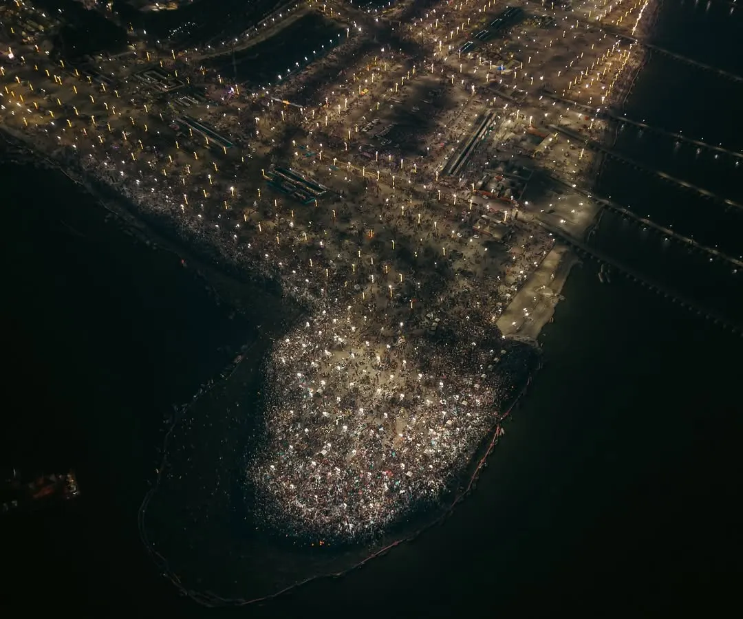 An aerial night shot of the Mahakumbh Mela, where the gathering of millions for the holy dip creates a constellation of light against the dark river. This image highlights my expertise in low-light drone photography for large-scale events, capturing the spiritual energy of the world's largest gathering.