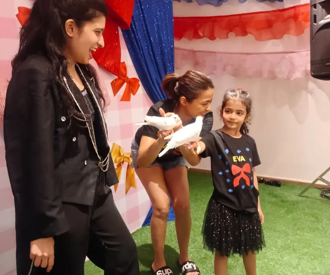 It was a joy performing for Surveen Chawla's daughter's birthday. Here, her daughter gets to meet one of my gentle doves. It's a special moment when kids can safely interact with the animals after the show.