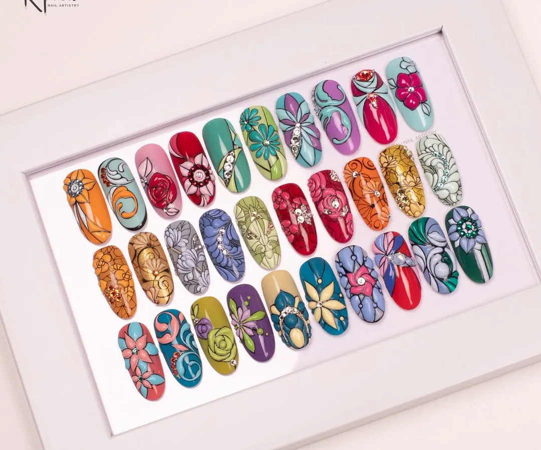 A glimpse into my portfolio of hand-painted nail art. This collection shows the variety I love to create, from vibrant florals and 3D embossed patterns to detailed line work, all framed to showcase the artistry.