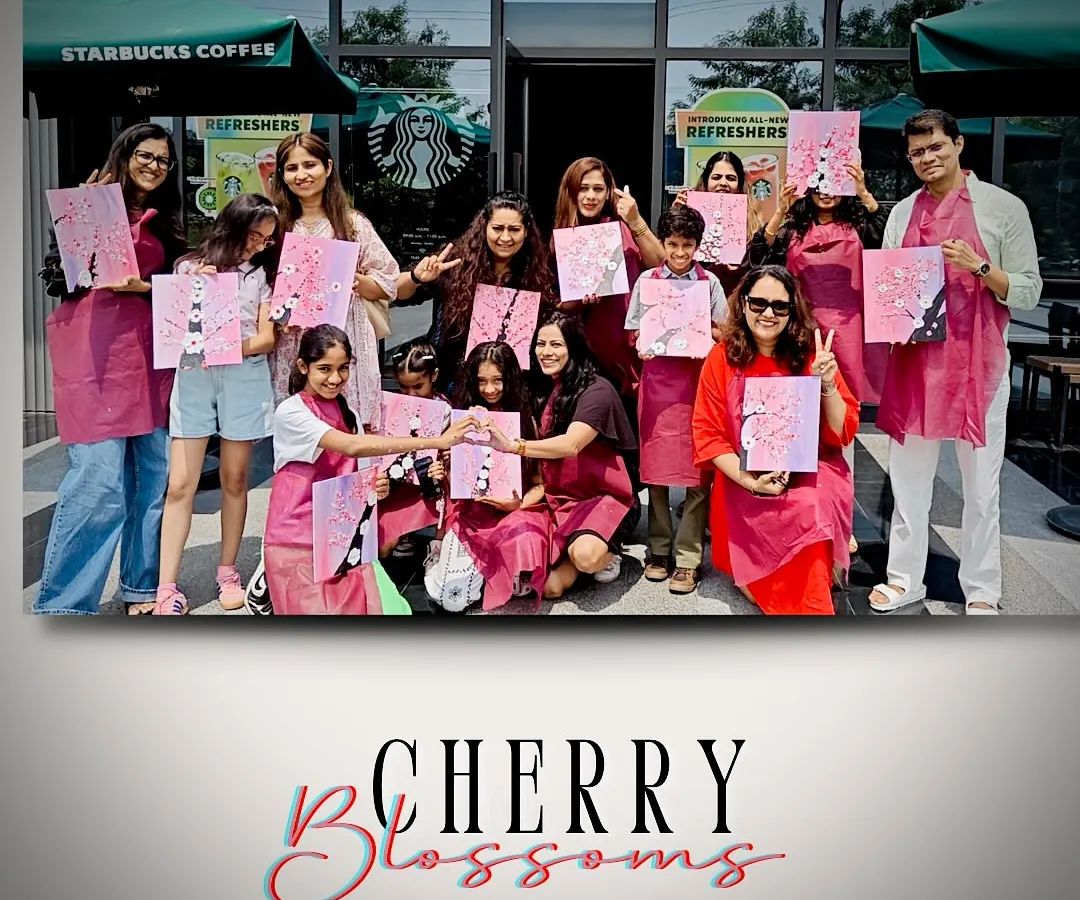 Look at these smiles. This is our Cherry Blossom workshop crew, a beautiful mix of friends, families, and solo explorers, all holding up masterpieces they created themselves. This is the energy and community you become a part of at our workshops.