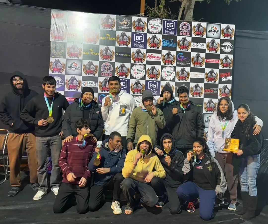 This is our family. A team of champions celebrating a massive haul of medals at the Elite Combat MMA championship in Ajmer. We train together, we win together.