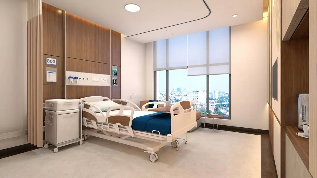 A patient's environment is integral to their recovery. In this private room at AIG Hospitals, we prioritized natural light and expansive city views, creating a serene, comfortable space that feels less clinical and more like a place of rest and healing.