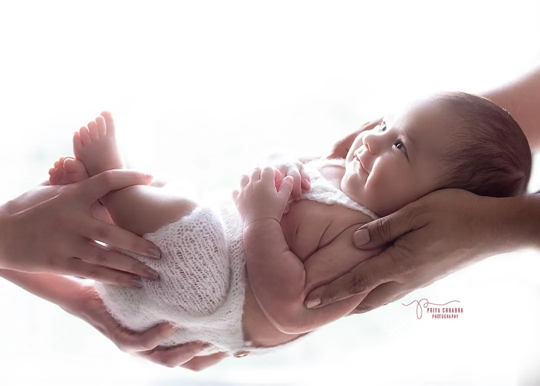 There is a special kind of magic in a newborn's first few days. I focus on creating a safe and gentle space to capture these peaceful, fleeting moments, preserving the memory of just how small they once were.