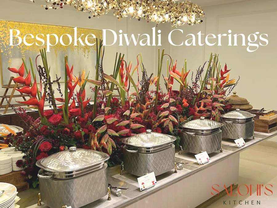 This is an example of my bespoke Diwali catering service. The setup features elegant silver chafing dishes and a stunning tropical flower arrangement, creating a festive and luxurious atmosphere for your celebration.