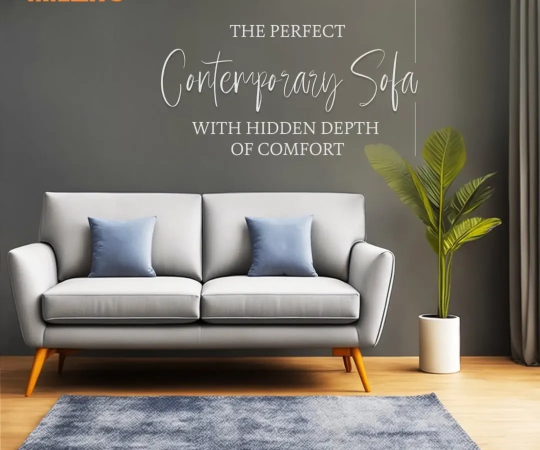 This contemporary two-seater sofa is a perfect example of our design philosophy: clean lines, deep comfort, and elegant style. Upholstered in a durable light grey fabric with tapered wooden legs, it's a versatile piece for any modern living room.