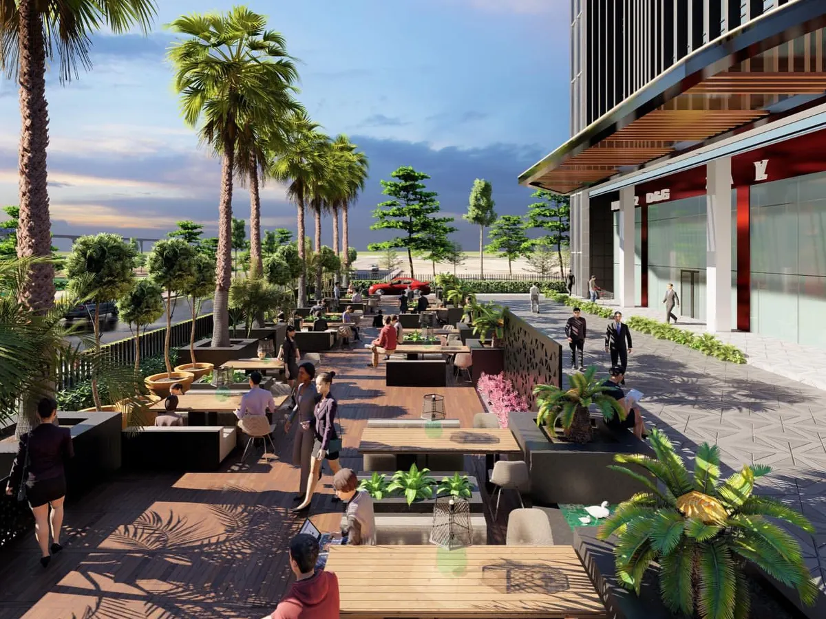 We designed this Grade-A business building on the Noida-Greater Noida expressway with sprawling green outdoor spaces. The retail and cafe areas open directly onto these patios, blurring the line between indoors and outdoors and creating a vibrant, welcoming atmosphere for employees and visitors.