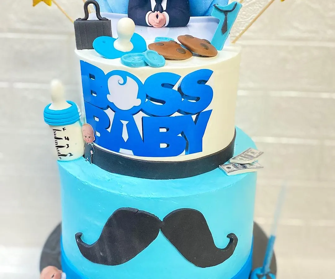 Who's the boss? This two-tier butterscotch Boss Baby cake is one of our most popular first birthday themes. We love creating detailed, fun-filled cakes for your little one's big milestones.